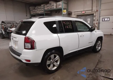 2014 Jeep Compass Sport z USA, uszkodzony, nr VIN 1C4NJDBB2ED880465